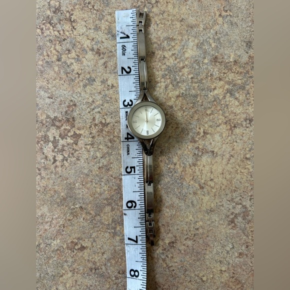 5/$25 Laura Scott silver bangle like watch. Cute and easy to wear. Pre-owned - Picture 4 of 6